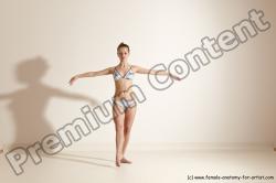 Swimsuit Gymnastic poses Woman White Moving poses Slim long brown Dynamic poses Academic